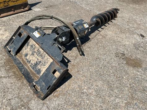 skid steer post hole digger|bobcat 15c post hole digger.